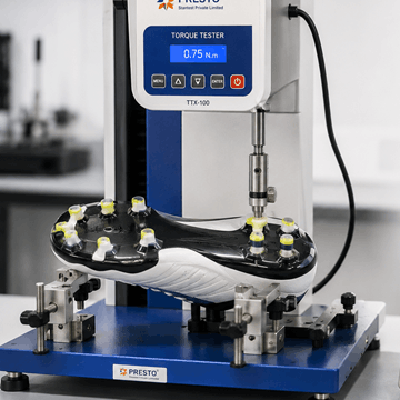 Sports shoe cleats release torque